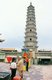 China: Two men and a monk paying their respects to Guanyin in front of the Kumarajiva Pagoda, built to house the bones of the eminent Kuchean Buddhist monk, Kumārajīva (334 - 413 CE), Luoshi Si Ta, Wuwei, Gansu Province